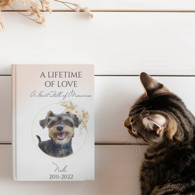 Pet memorial journal with a customizable cover featuring a pet photo, name, and years, designed for healing and cherishing memories