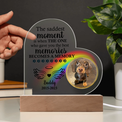Personalized heart-shaped acrylic memorial plaque featuring a photo of a dog, rainbow design, heartfelt quote, and LED wooden base