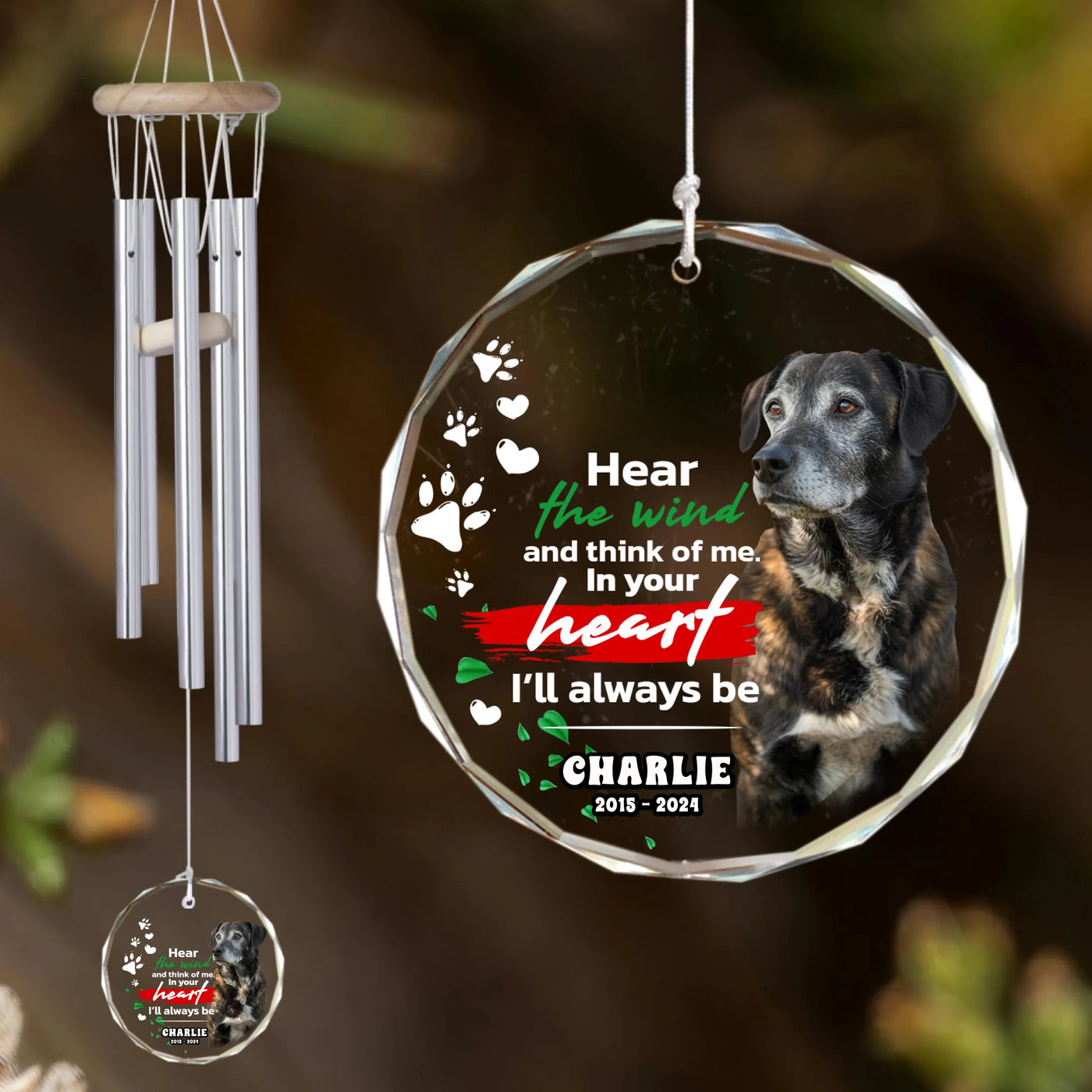 Circle-shaped glass ornament wind chime personalized with a dog photo and memorial quote, hanging outdoors in sunlight