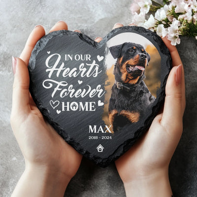 Heart-shaped memorial stone featuring a pet photo, the quote "In Our Hearts Forever Home," and custom details, ideal for dog remembrance
